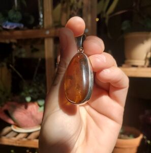 Elegant Silver and Amber Pendant Necklace